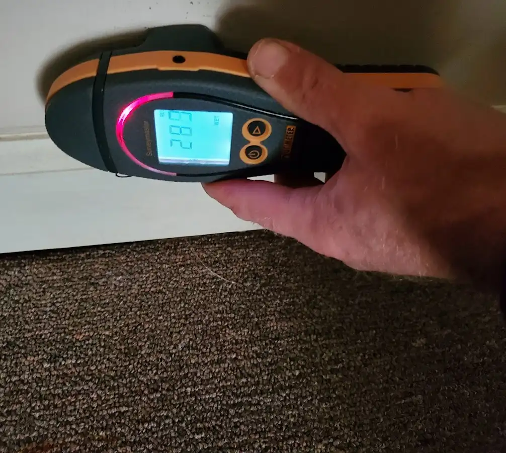 Moisture detection at baseboard during Sewage Cleanup & Sanitation in Clarksburg